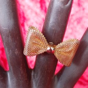 Cute and fun gold bow tie ring.